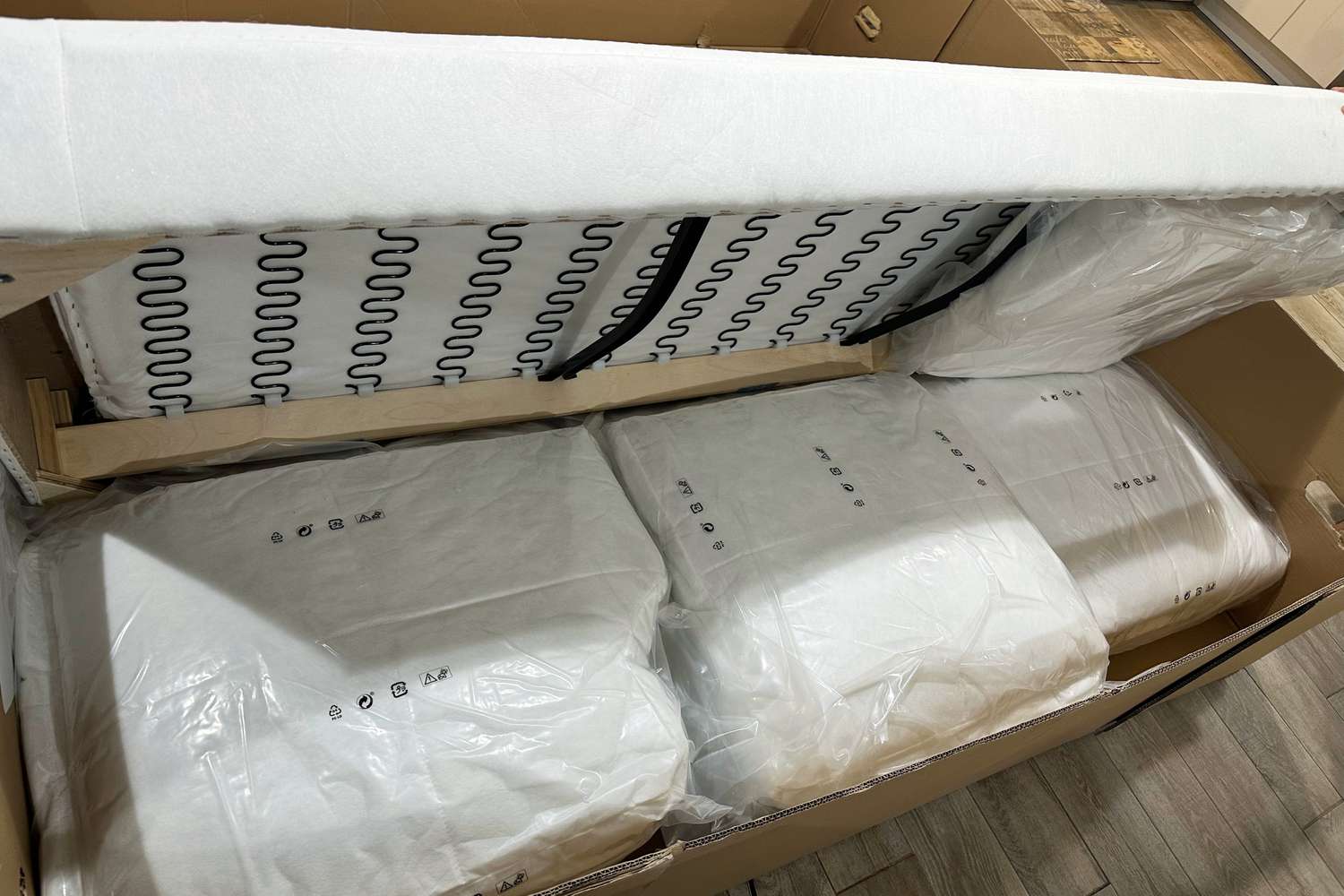 The cusions of the IKEA Uppland Sofa in a box